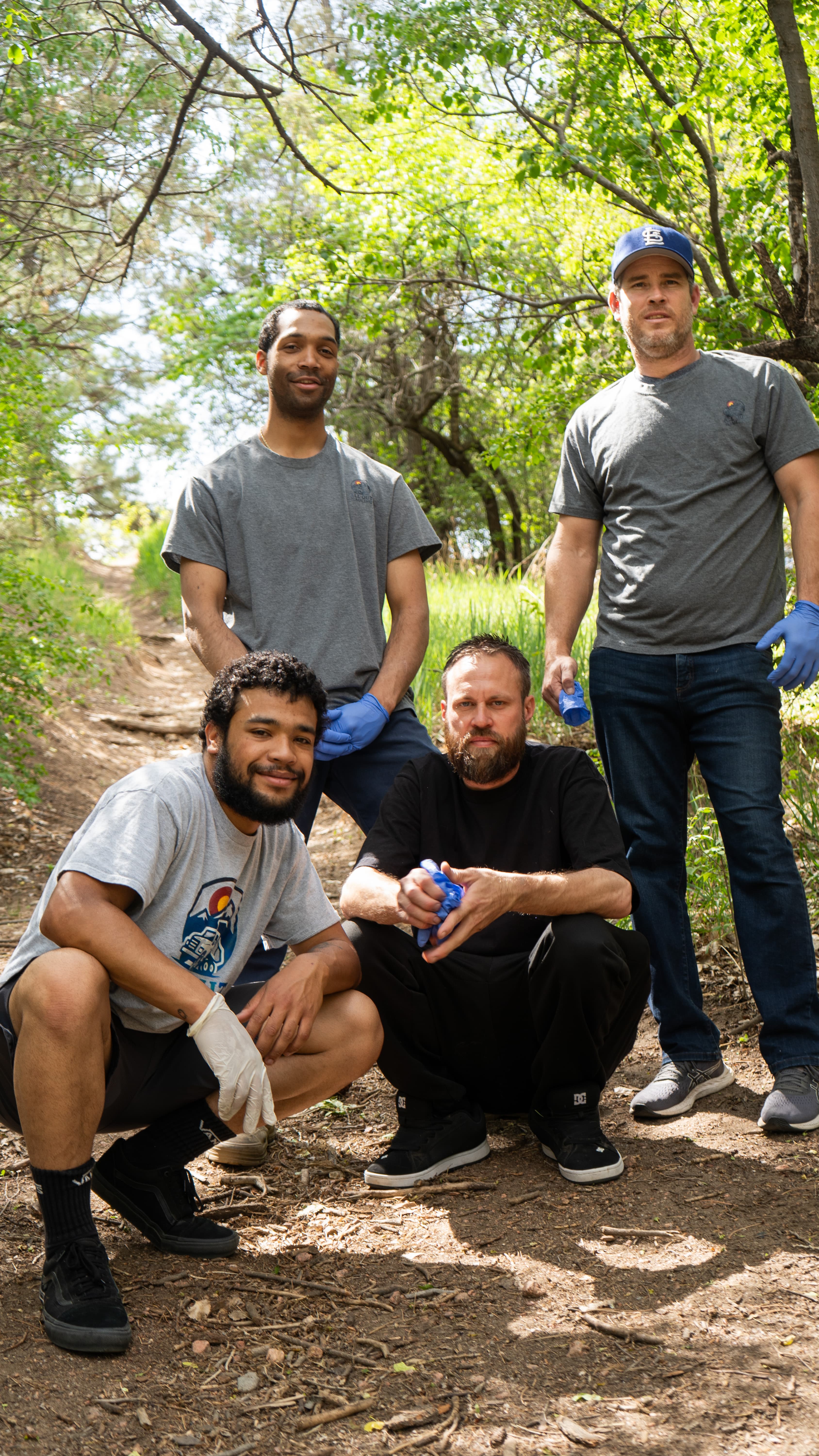 All Out Hauling team outdoors during a community cleanup